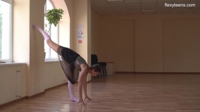 Flexible Lust: Gymnast Bends and Poses for the Camera